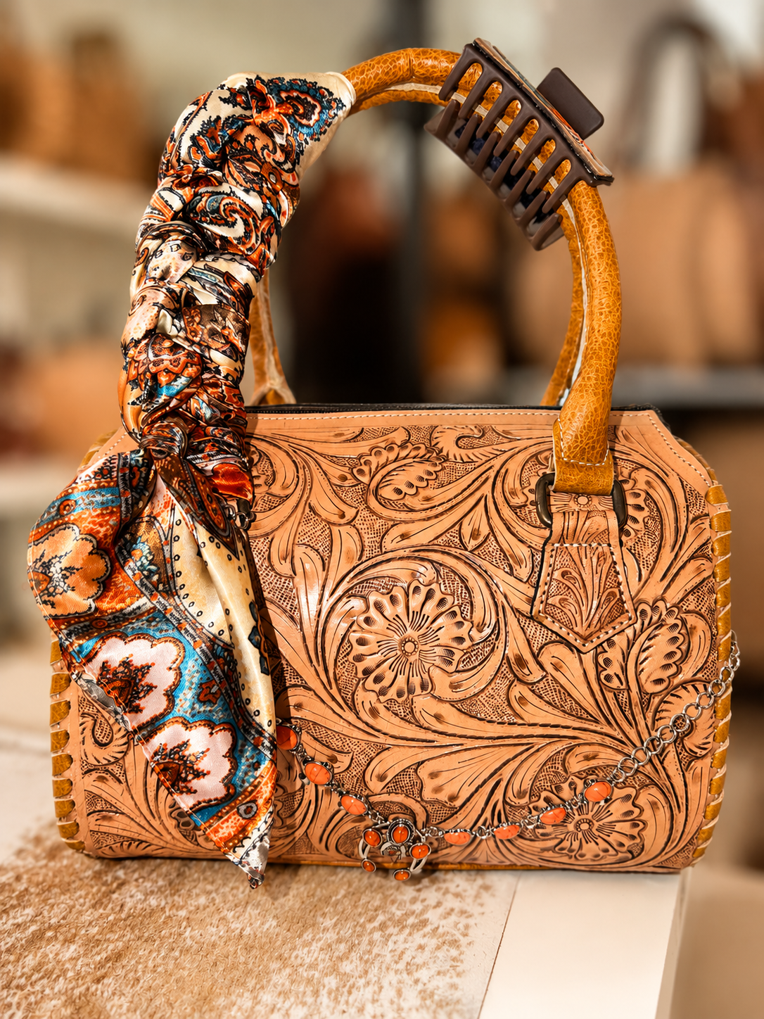 Coral Creek medium speedy handbag dressed with wilder and charm!