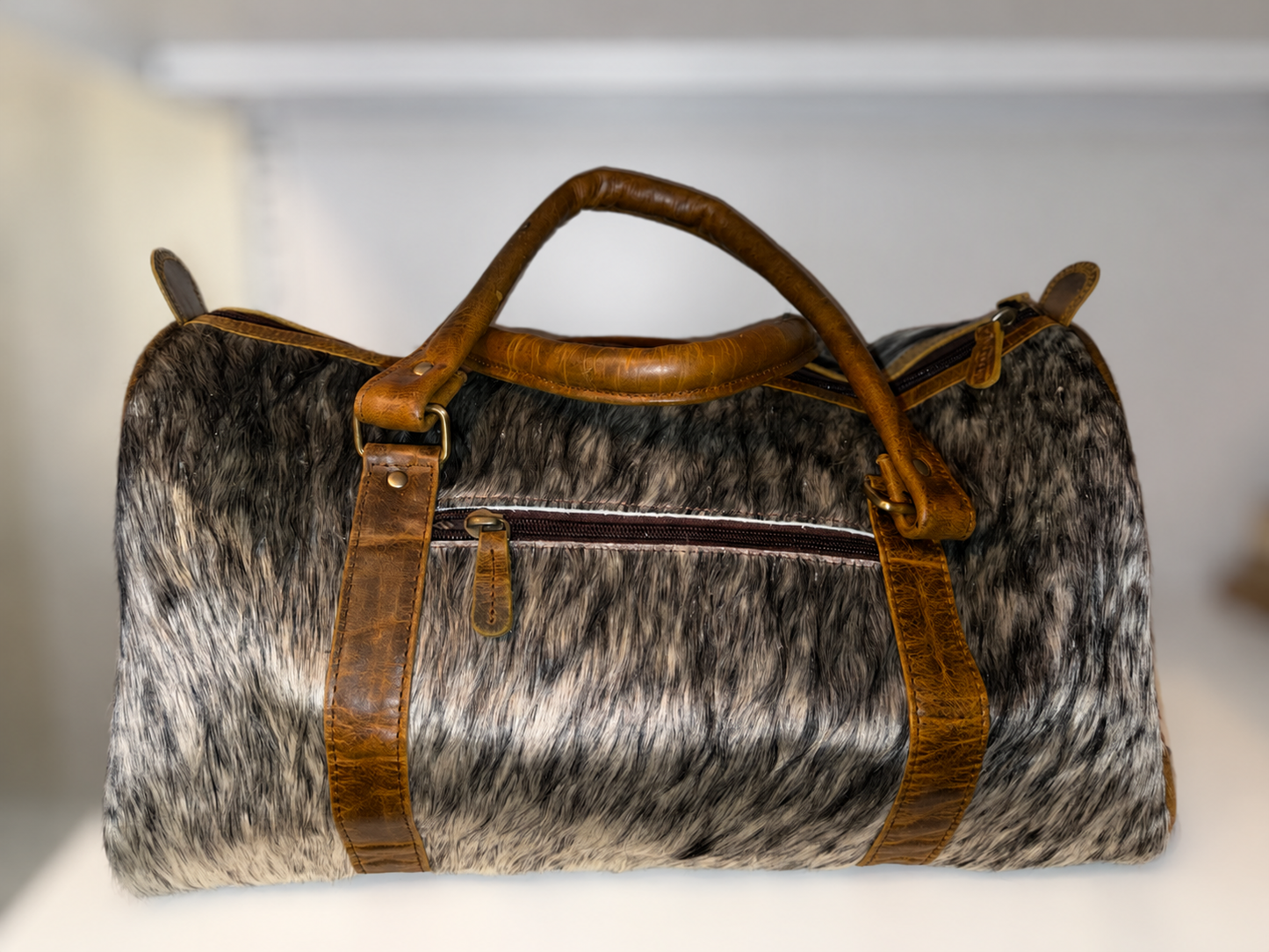 Roan cowhide duffle bag with crossbody strap!