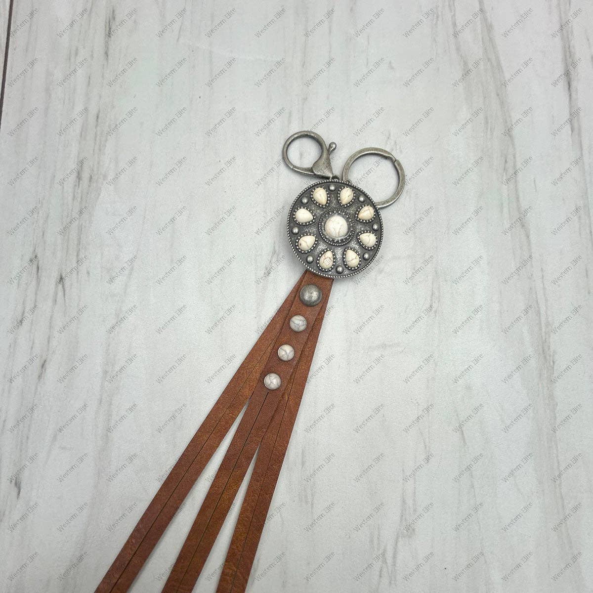 Western Elite Jewelry - NKY250121-59                  Silver metal and white stone with brown leather Key chain